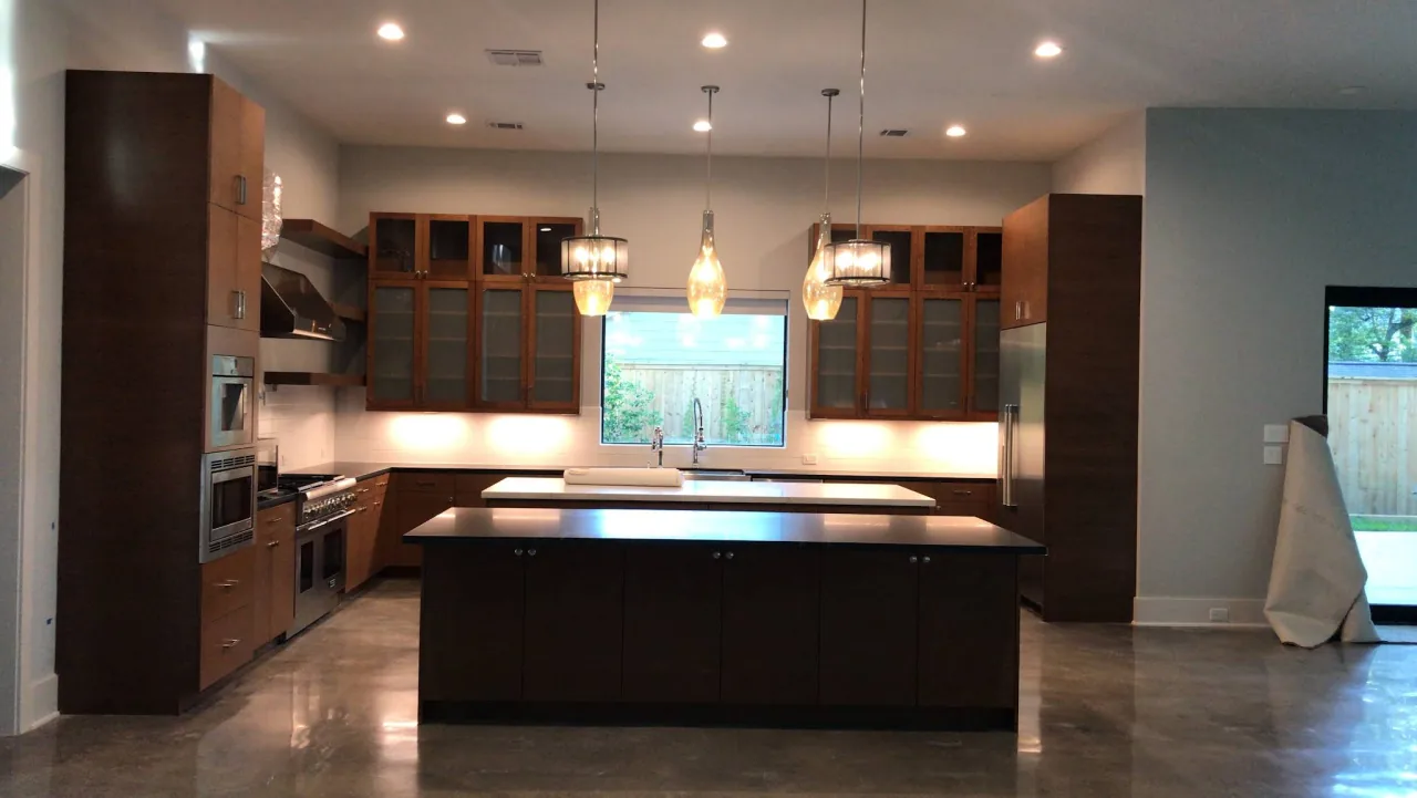 Another view of the same RM kitchen, facing the window and two islands.